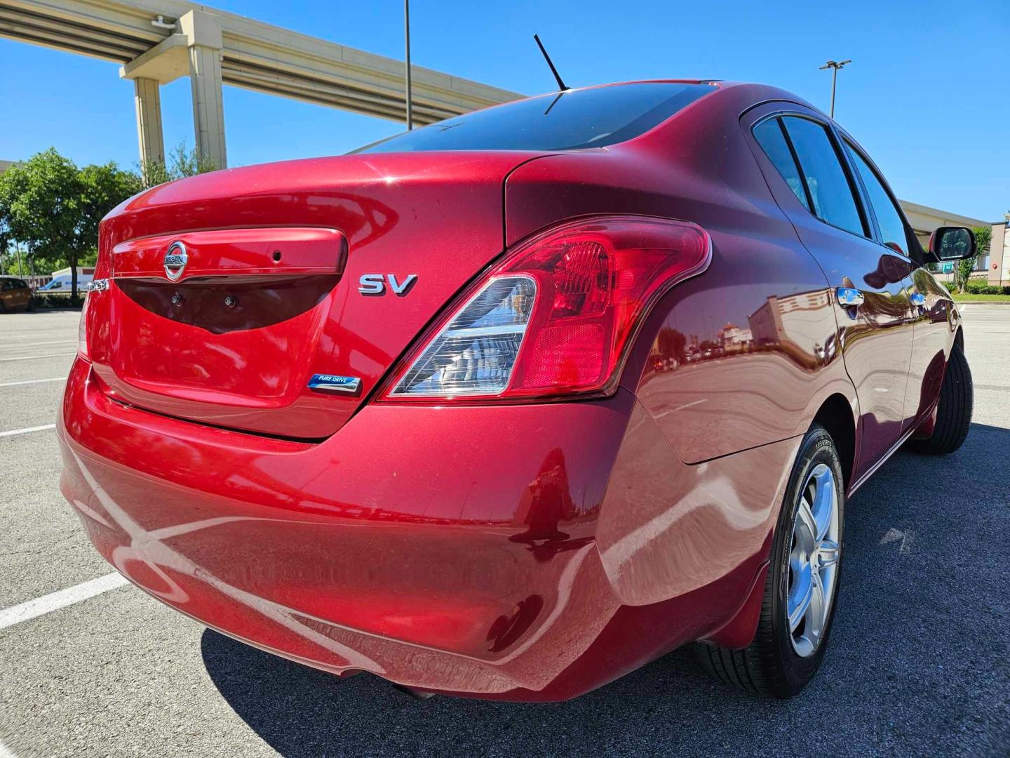 2012 Red /Black Nissan Versa (3N1CN7AP8CL) , located at 5005 Telephone Rd., Houston, TX, 77087, (713) 641-0980, 29.690666, -95.298683 - Photo#3